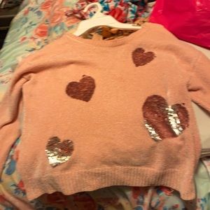 Sweater with flip up sequence hearts